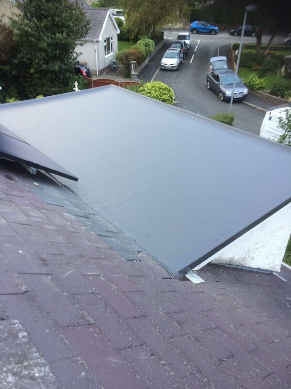 slate roof and edpm flat roof